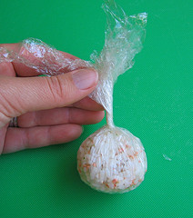 Using plastic wrap to form rice ball
