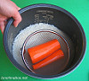 Steaming carrots with rice in a rice cooker Steaming carrots with rice in a rice cooker