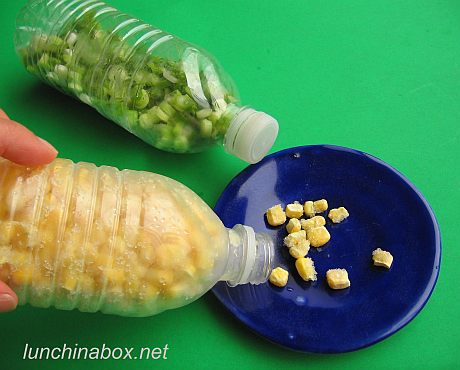 Frozen corn in plastic water bottle