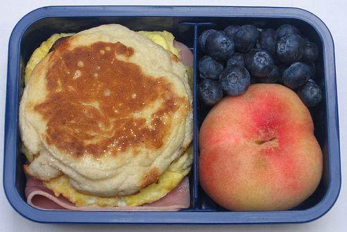 English muffin sandwich and fruit